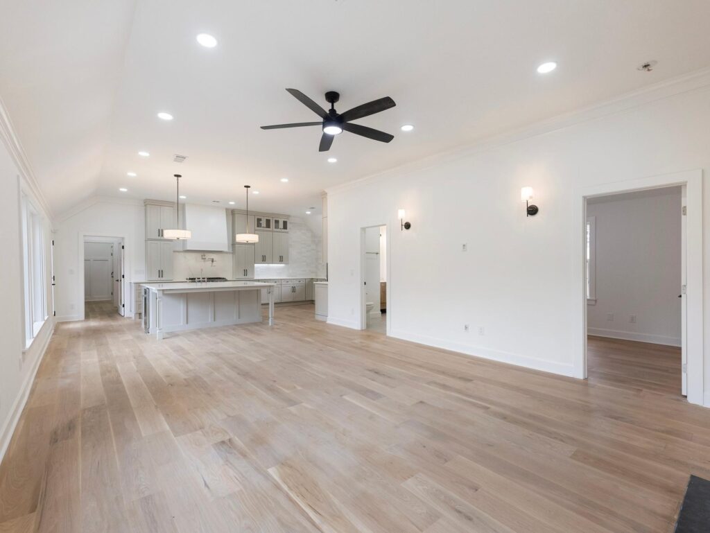 Living room and kitchen in a whole-home renovation by VIBE Luxury Homes in Amberidge, Atlanta