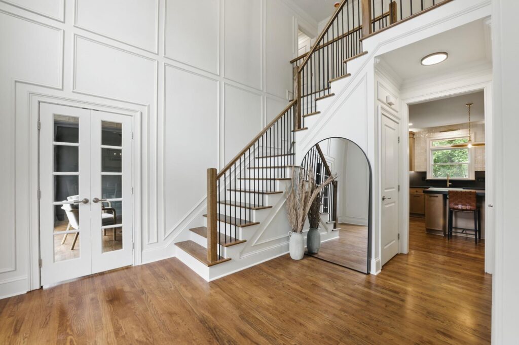 Entry staircase in a custom home built by VIBE Luxury Homes in Asbury Park, Atlanta