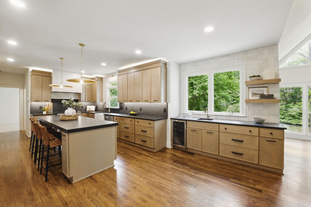 Kitchen and great room in a custom home built by VIBE Luxury Homes in Asbury Park, Atlanta
