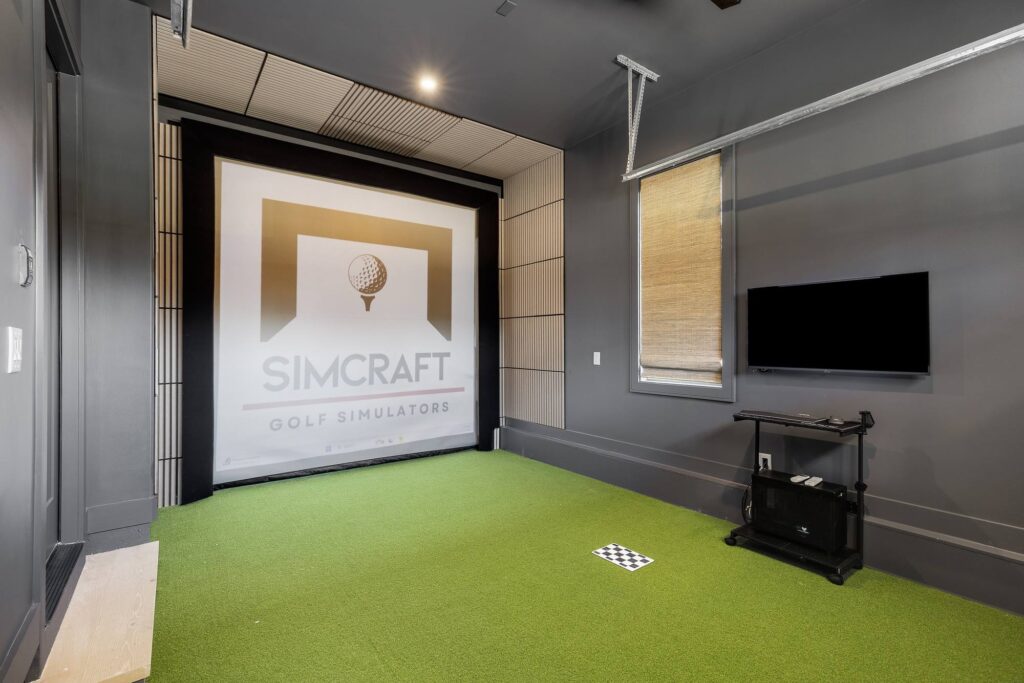 Golf simulator room in a custom home built by VIBE Luxury Homes in Brookhaven, Atlanta