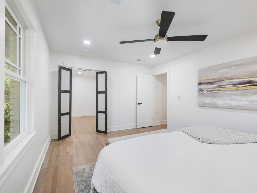 Primary bedroom in a whole-home renovation by VIBE Luxury Homes in the Sherbrooke neighborhood, Atlanta
