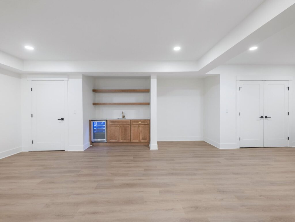 Finished basement in a whole-home renovation by VIBE Luxury Homes in the Sherbrooke neighborhood, Atlanta