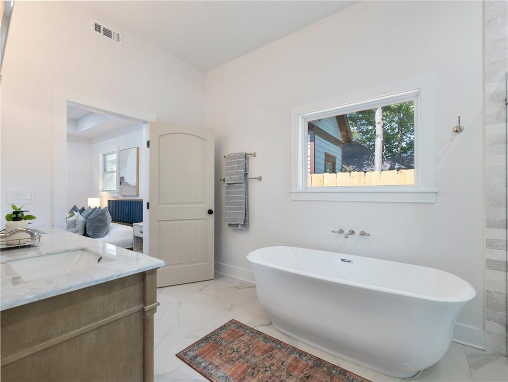 Primary bathroom in a bungalow renovation by VIBE Luxury Homes in Atlanta’s West End