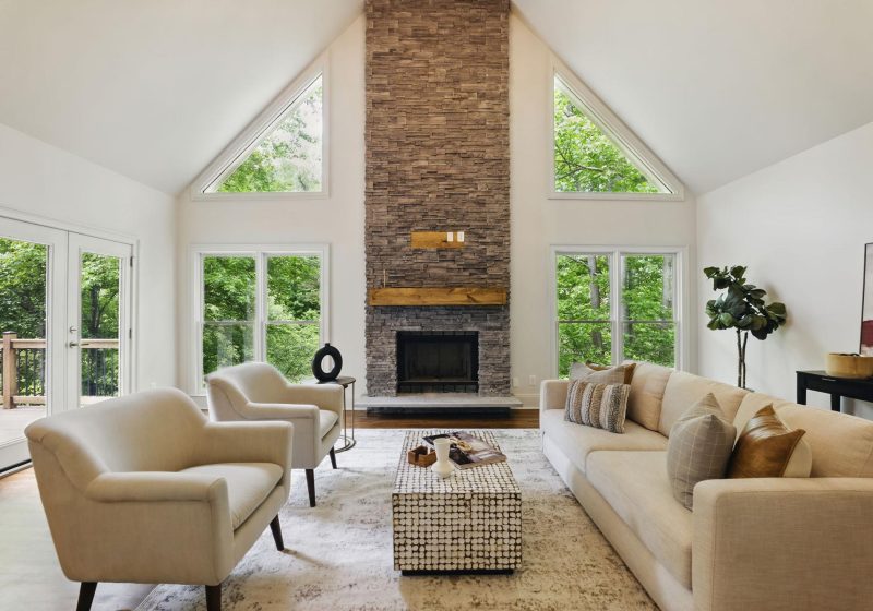 Great room with stone fireplace in a custom home built by VIBE Luxury Homes in Asbury Park, Atlanta
