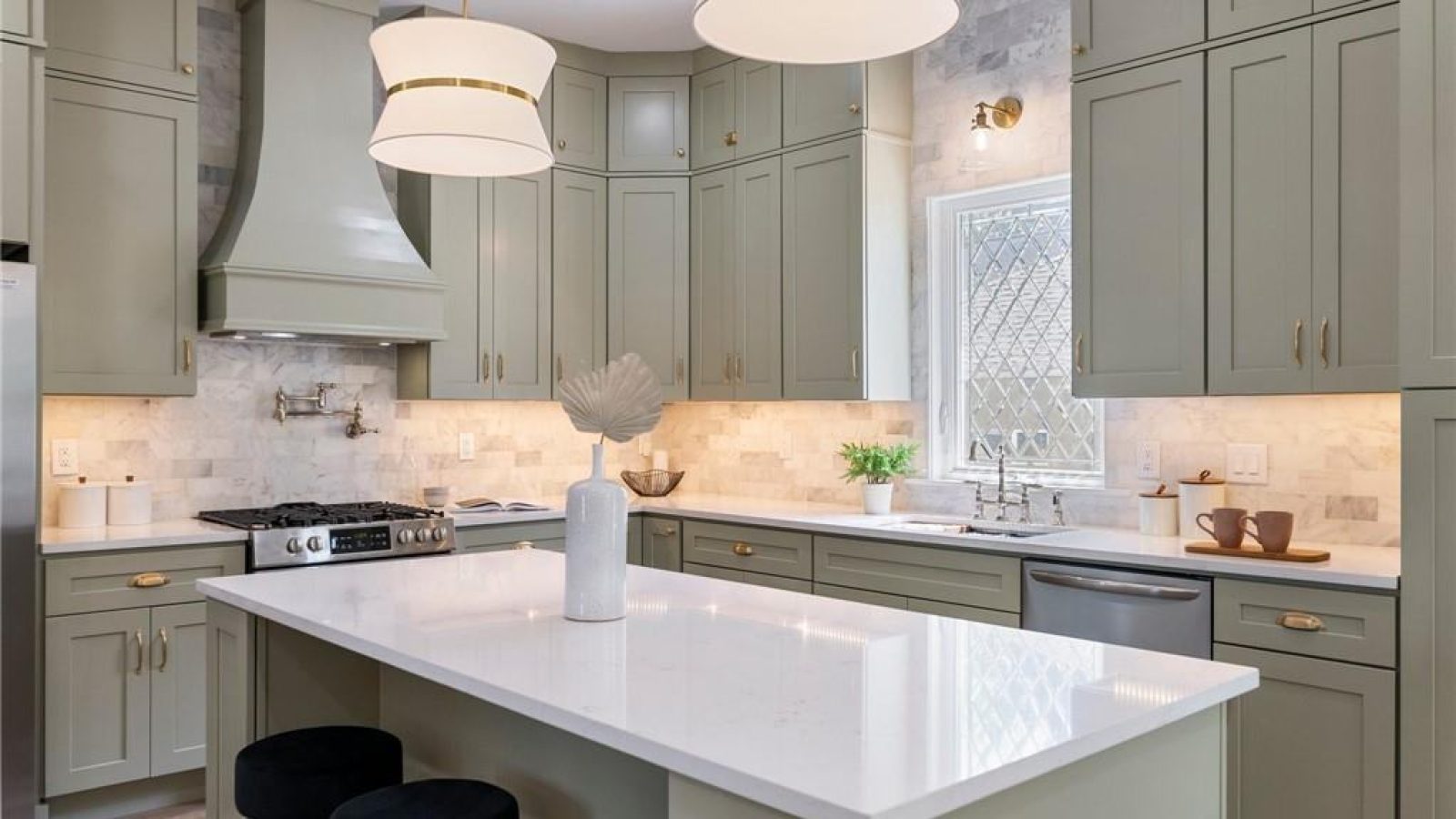 Kitchen island in a bungalow renovation by VIBE Luxury Homes in Atlanta’s West End